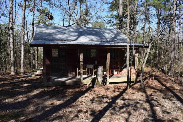 view of outbuilding featuring a porch