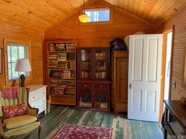 sitting room featuring vaulted ceiling, wooden ceiling, and dark hardwood / wood-style floors