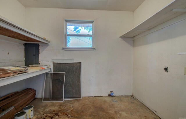 laundry room with electric panel and hookup for an electric dryer