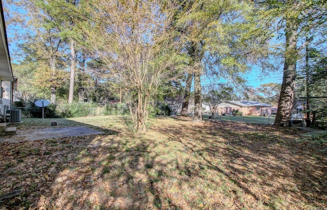 view of yard featuring a patio area and cooling unit