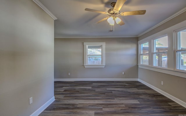 unfurnished room featuring dark hardwood / wood-style floors, ceiling fan, and ornamental molding