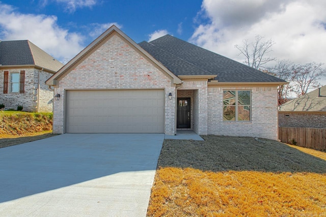 view of front of home with a garage