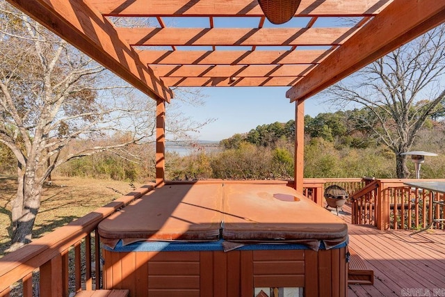 wooden terrace featuring a pergola and a hot tub