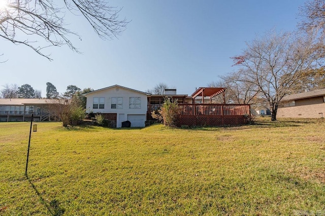 view of yard featuring a wooden deck