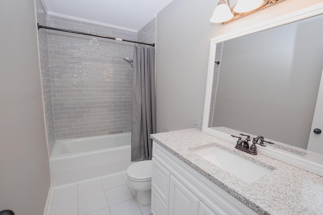 full bathroom featuring tile patterned floors, shower / bath combo with shower curtain, vanity, and toilet