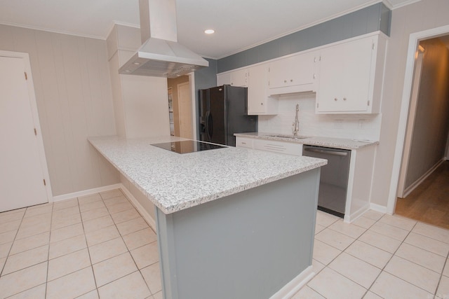 kitchen with sink, island range hood, white cabinets, black appliances, and ornamental molding