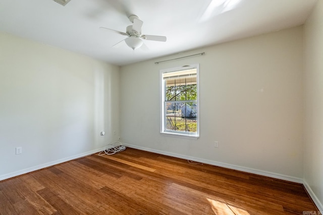 empty room with light hardwood / wood-style floors and ceiling fan