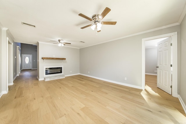 unfurnished living room featuring crown molding, light hardwood / wood-style flooring, and ceiling fan