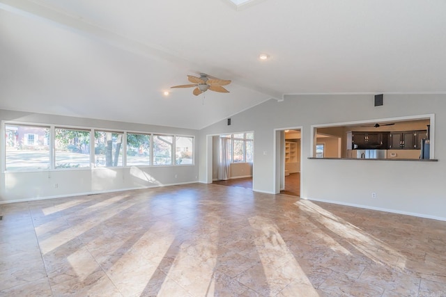 unfurnished living room featuring vaulted ceiling with beams and ceiling fan