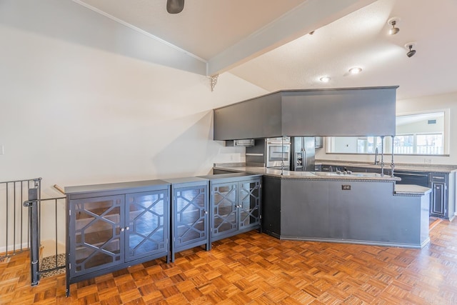 kitchen featuring kitchen peninsula, light parquet flooring, lofted ceiling with beams, and stainless steel refrigerator with ice dispenser