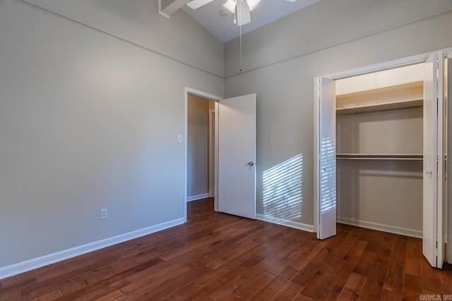 unfurnished bedroom featuring ceiling fan, dark hardwood / wood-style floors, and a closet