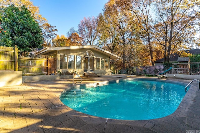 view of pool featuring a patio area