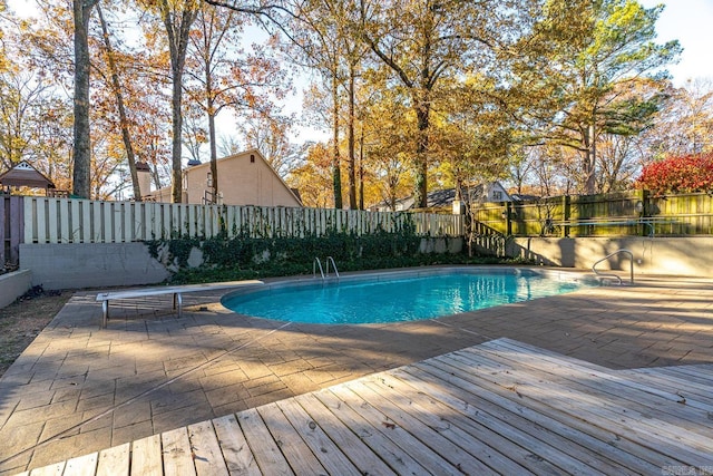 view of pool featuring a patio area