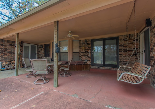 view of patio / terrace featuring ceiling fan