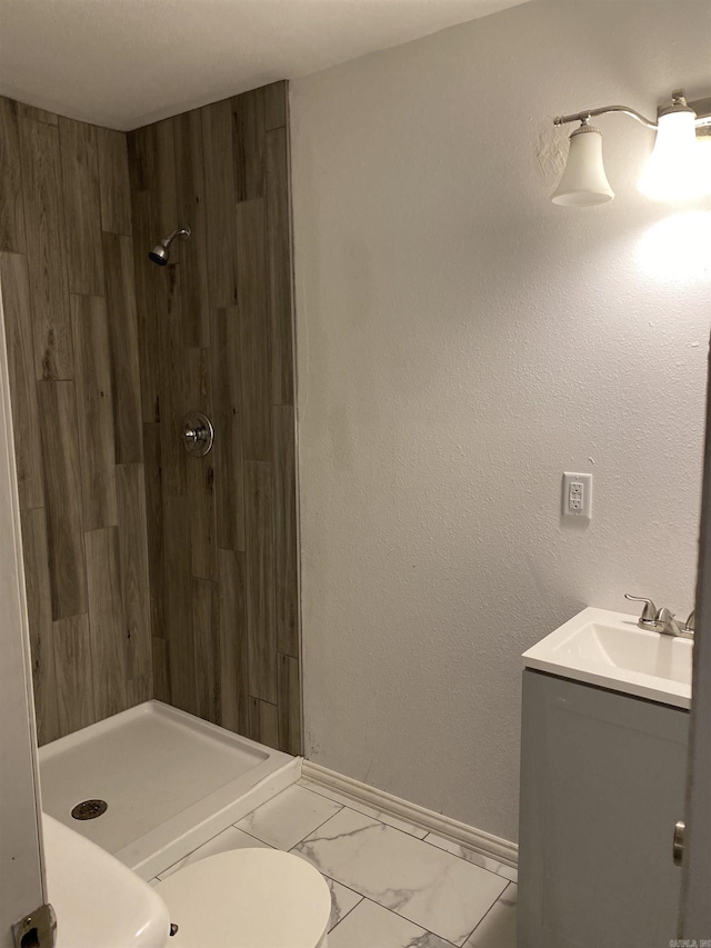 bathroom with vanity and walk in shower