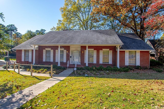 view of front facade with a porch and a front lawn