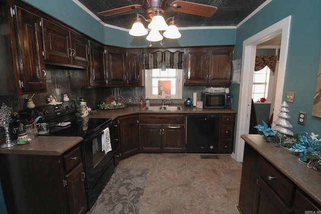 kitchen featuring black appliances, decorative backsplash, dark brown cabinetry, and sink