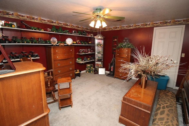 office space with carpet flooring and ceiling fan