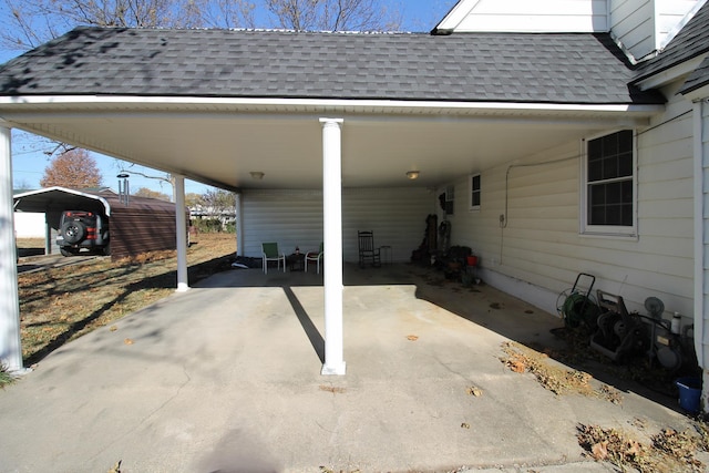 view of patio featuring a carport