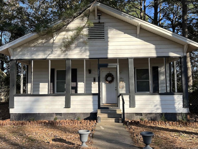 bungalow-style home with covered porch