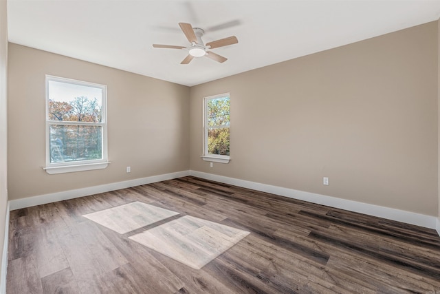 unfurnished room featuring ceiling fan, a healthy amount of sunlight, and wood-type flooring