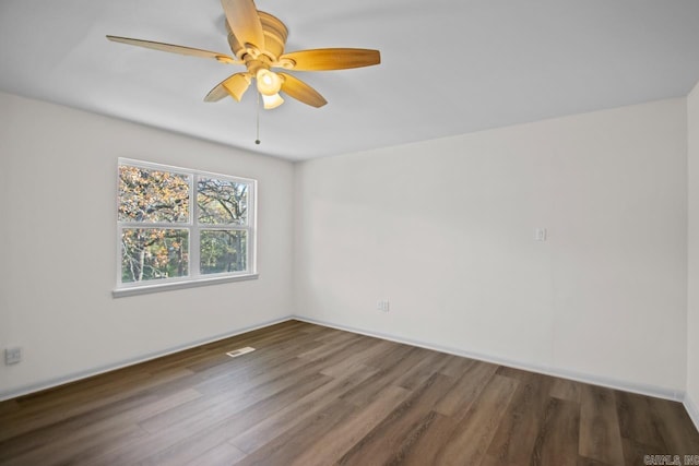 3630 Idlewild Ave, North Little Rock, AR 72116 - empty room with wood finished floors and ceiling fan