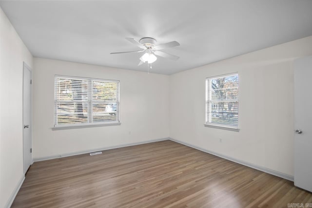 3630 Idlewild Ave, North Little Rock, AR 72116 - spare room featuring wood finished floors and ceiling fan