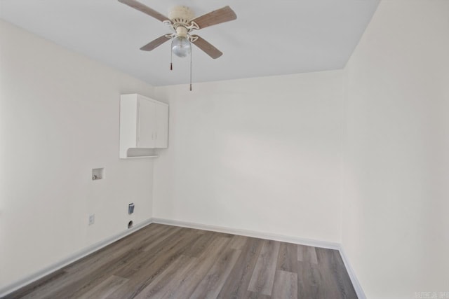 spare room featuring hardwood / wood-style floors and ceiling fan