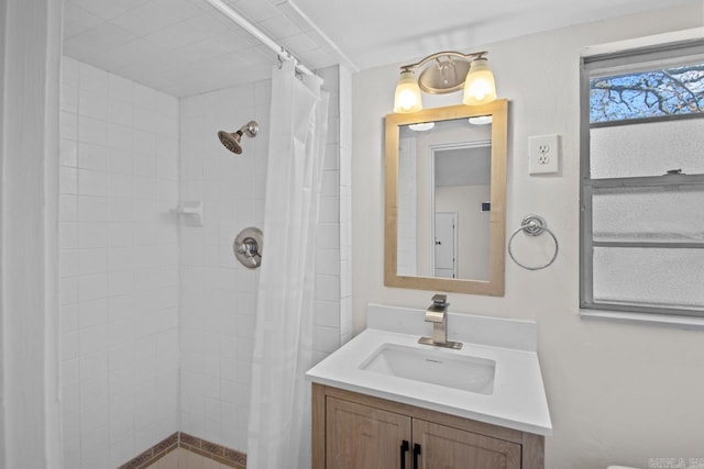 3630 Idlewild Ave, North Little Rock, AR 72116 - bathroom with vanity and a tile shower