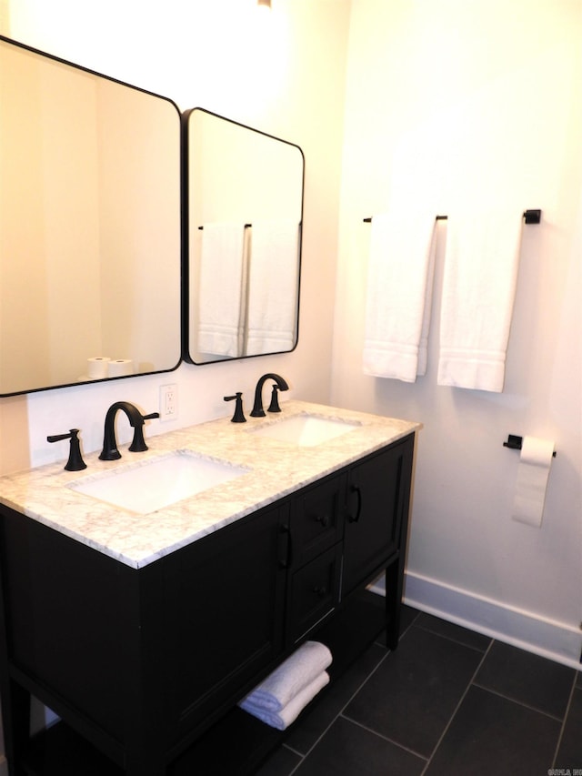 bathroom with vanity and tile patterned floors