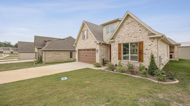 view of front facade featuring a front yard and a garage