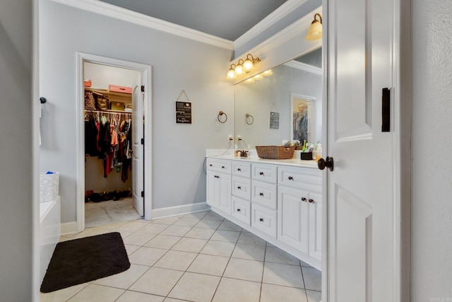 bathroom with tile patterned flooring, vanity, and crown molding