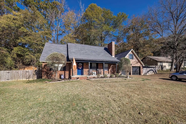 view of front of house with a porch and a front lawn