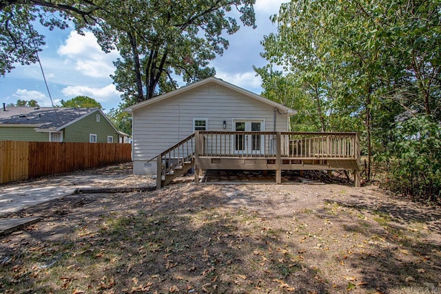 back of house featuring a deck