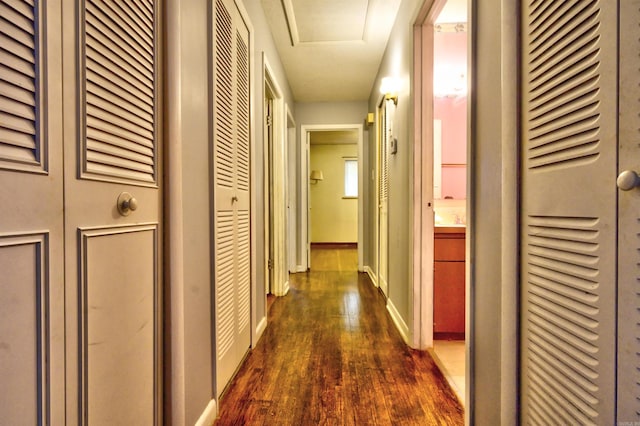 hall featuring dark hardwood / wood-style floors