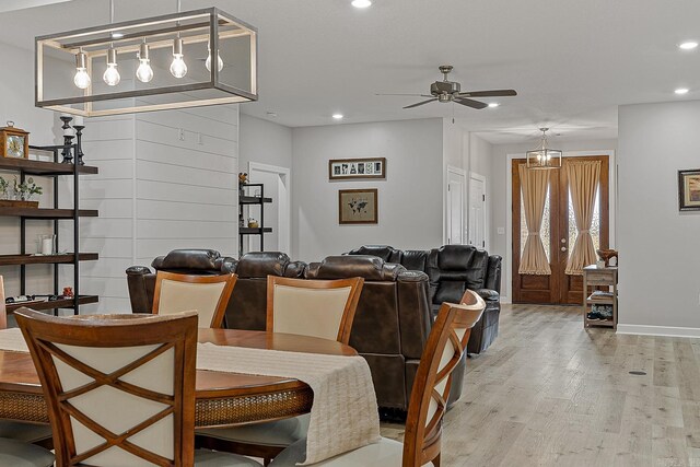 dining area featuring ceiling fan and light hardwood / wood-style flooring