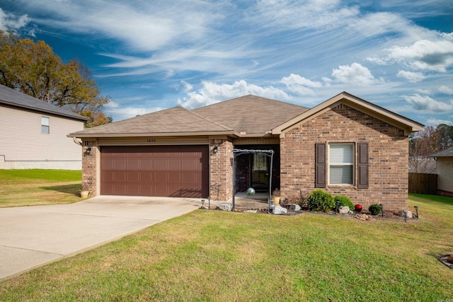 ranch-style home with a front lawn and a garage