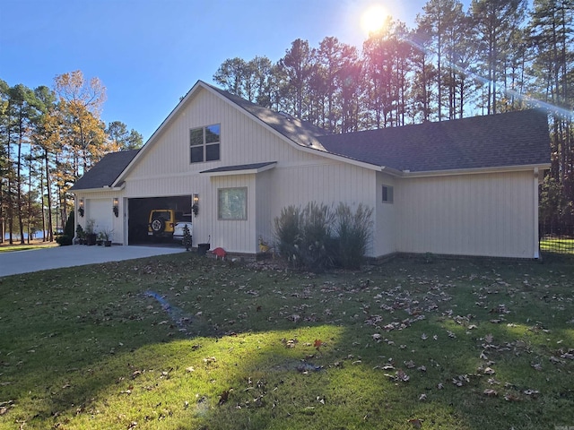 view of front facade with a front yard and a garage