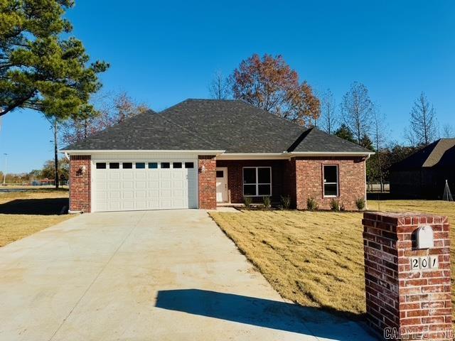 single story home with a garage