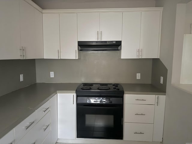 kitchen featuring tasteful backsplash, black range with electric stovetop, and white cabinets