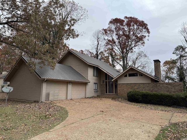 exterior space with a garage