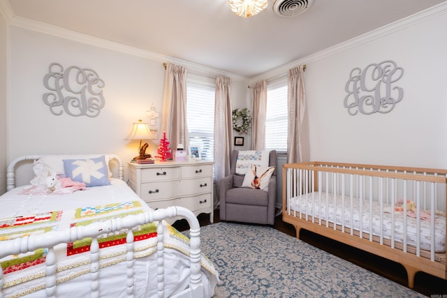 bedroom featuring crown molding