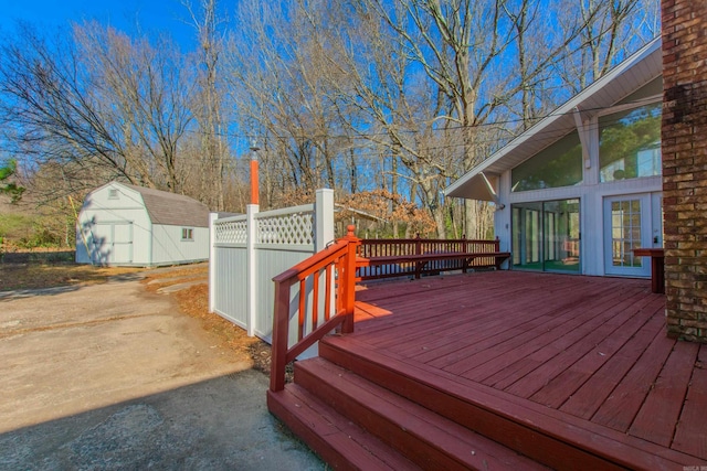 wooden deck with a shed