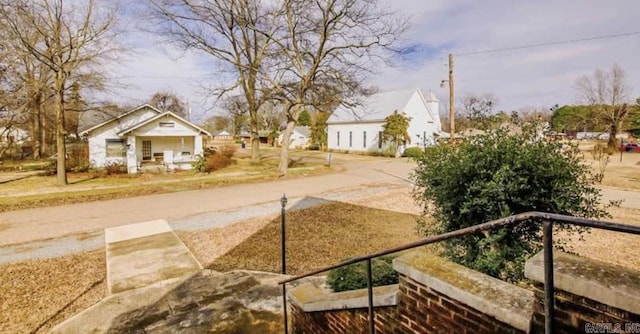 view of yard with a balcony