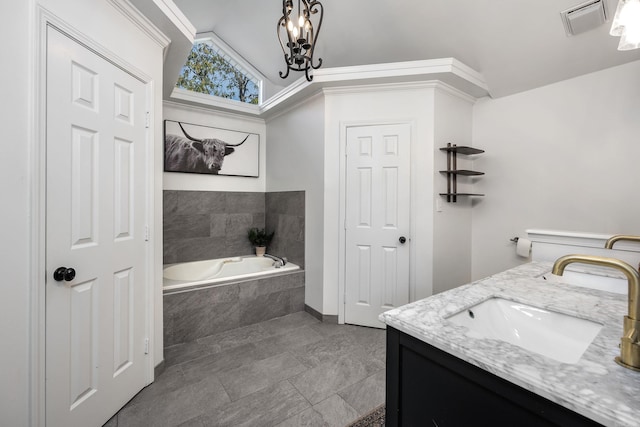 bathroom with vanity, lofted ceiling, tile patterned floors, a relaxing tiled tub, and a notable chandelier