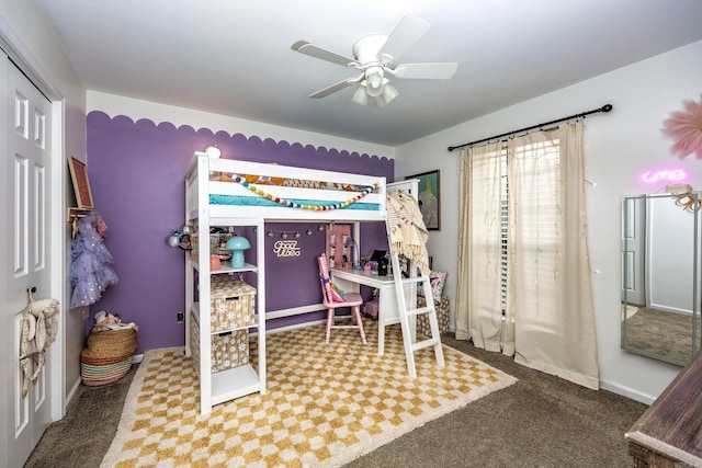 bedroom featuring carpet flooring, ceiling fan, and a closet