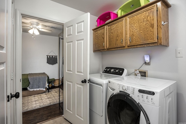 washroom with cabinets, independent washer and dryer, light wood-type flooring, and ceiling fan