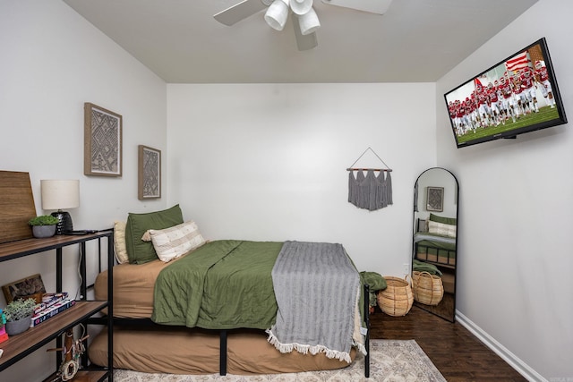 bedroom with ceiling fan and wood-type flooring