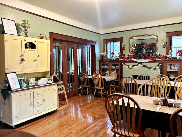 dining area featuring light wood-type flooring