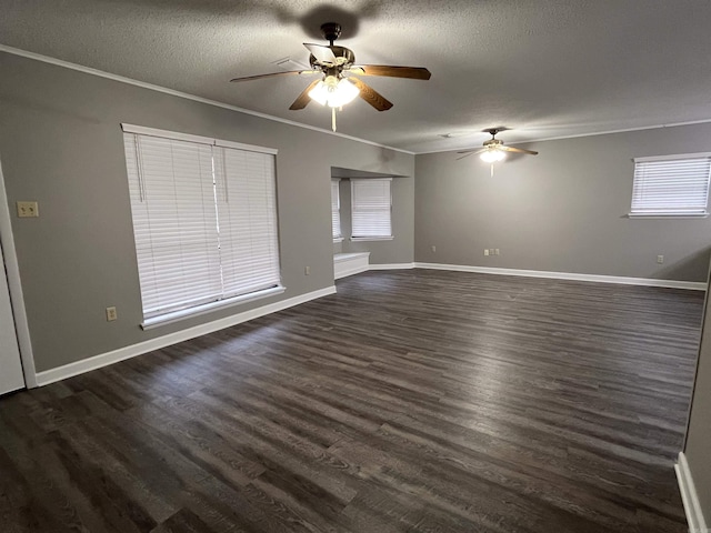 unfurnished room featuring crown molding, dark wood-type flooring, and a textured ceiling